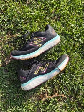 New Balance Women's Black Running Shoes with Teal & Pink Accents